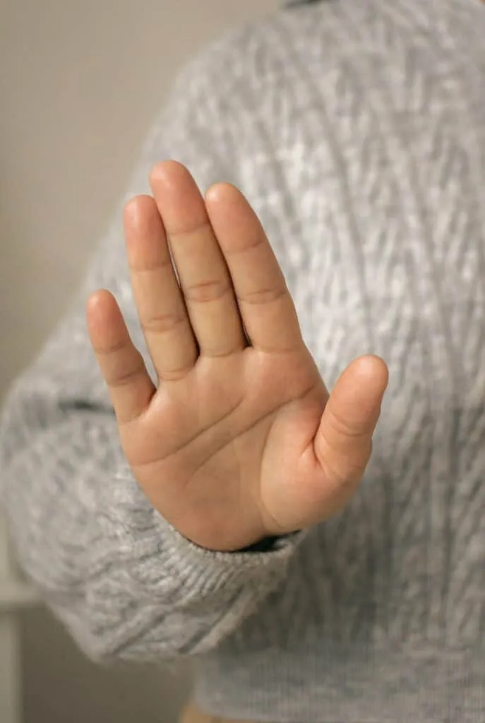 Verbal cue stay hand signal